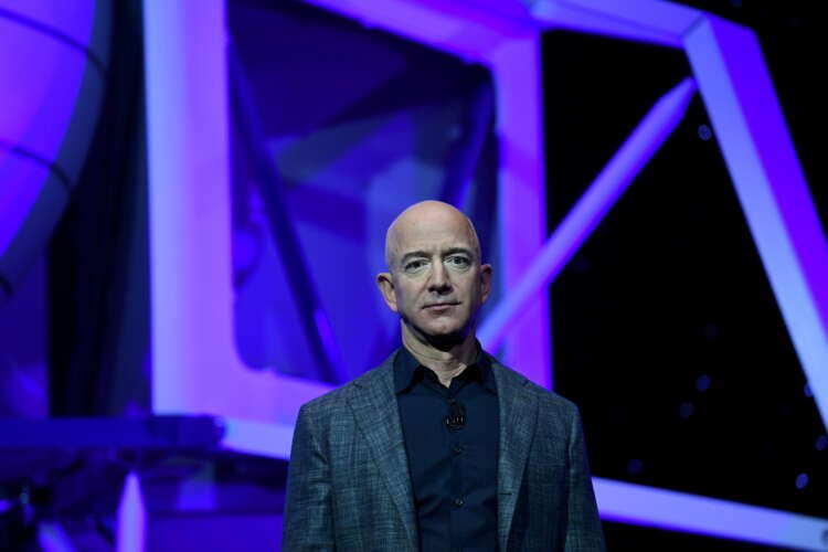 Jeff Bezos at Blue Origin event showcasing advancements in space exploration - Global Banking & Finance Review
