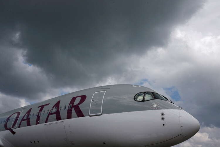 A Qatar Airways Airbus A350 XWB at an airshow, representing the ongoing Airbus-Qatar dispute - Global Banking & Finance Review