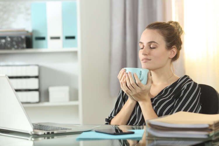 Entrepreneur resting drinking coffee at homeoffice