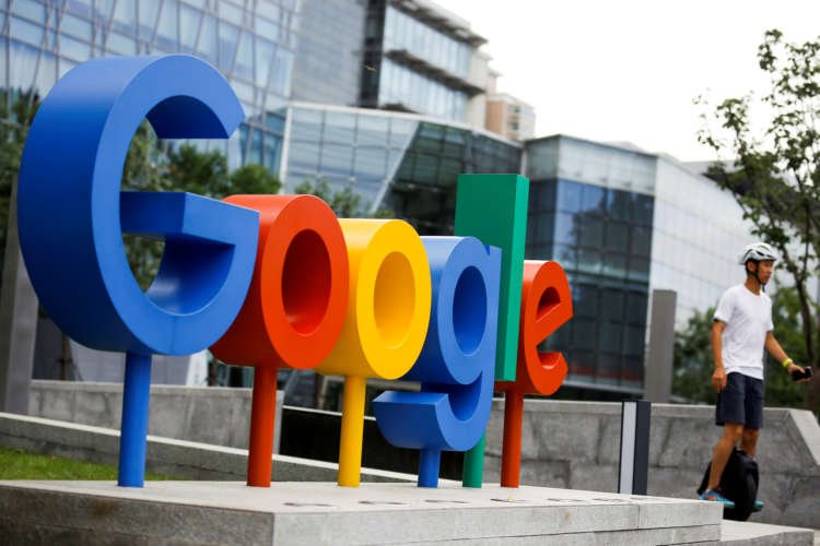FILE PHOTO: The brand logo of Alphabet Inc’s Google is seen in Beijing