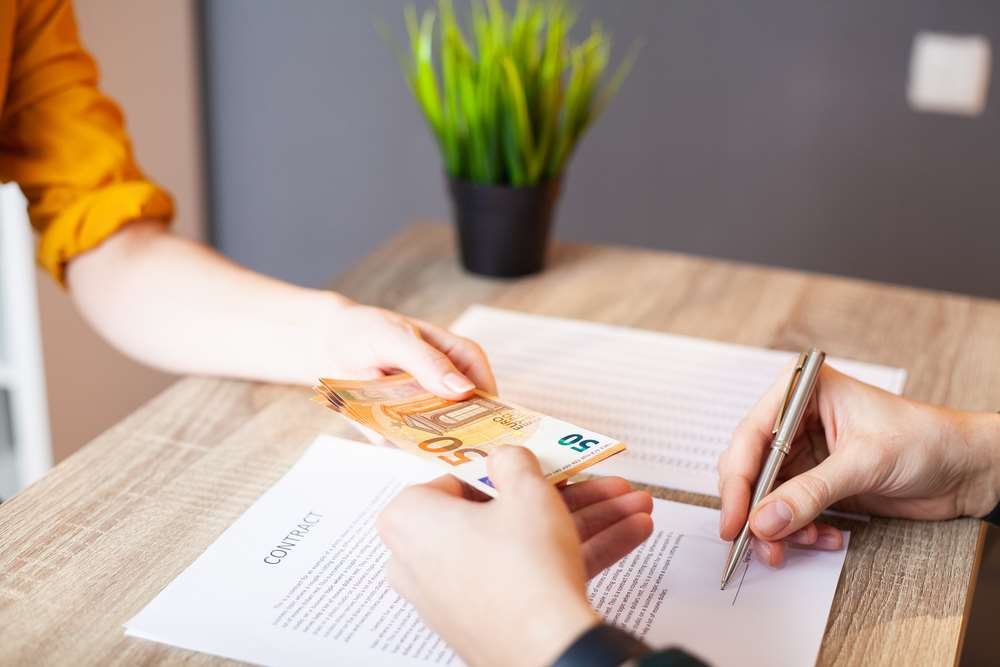 Professional discussing finance strategies to recover cash during coronavirus - Global Banking & Finance Review