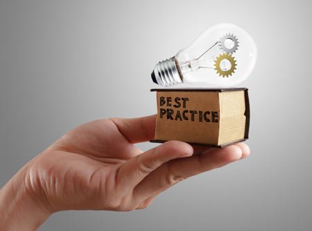 Business professionals discussing AxiomSL's Smart Cube reporting solution - Global Banking & Finance Review