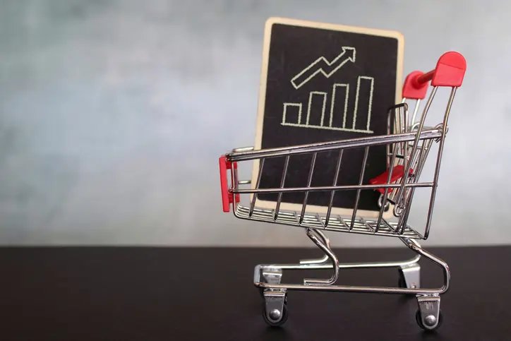 Investor analyzing market trends on a digital screen - Global Banking & Finance Review