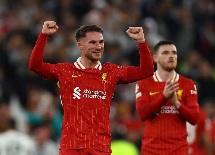 Liverpool players celebrating after defeating Real Madrid 2-0 in the Champions League - Global Banking & Finance Review