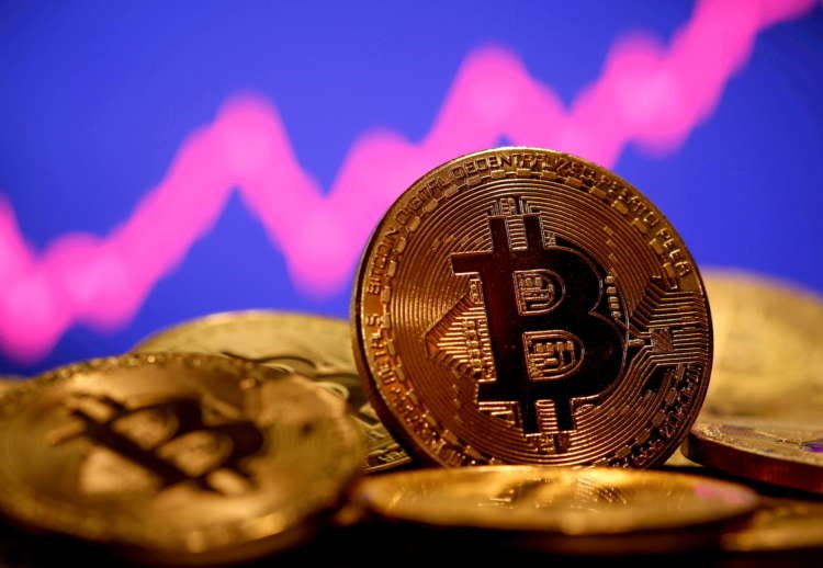 Bitcoin drops after report Binance under U.S. probe, Tesla move