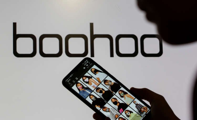 Boohoo app displayed on smartphone with Boohoo logo, related to supplier practices - Global Banking & Finance Review