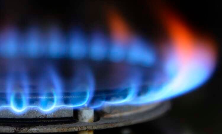 Gas cooker with flames, symbolizing rising energy costs in Europe - Global Banking & Finance Review