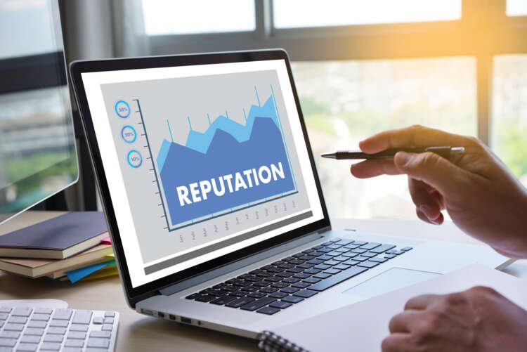 Business team strategizing crisis management to protect company reputation - Global Banking & Finance Review