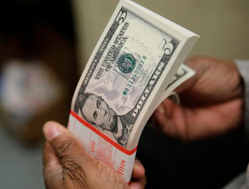 Image for Dollar gains as retail trading frenzy rattles investors