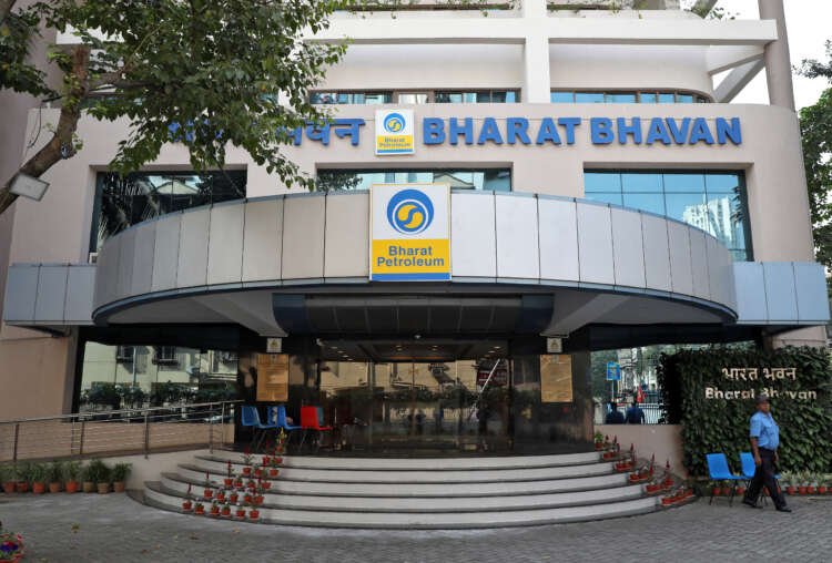 Security guard outside Bharat Petroleum Corp's office, highlighting BPCL's oil trade negotiations - Global Banking & Finance Review