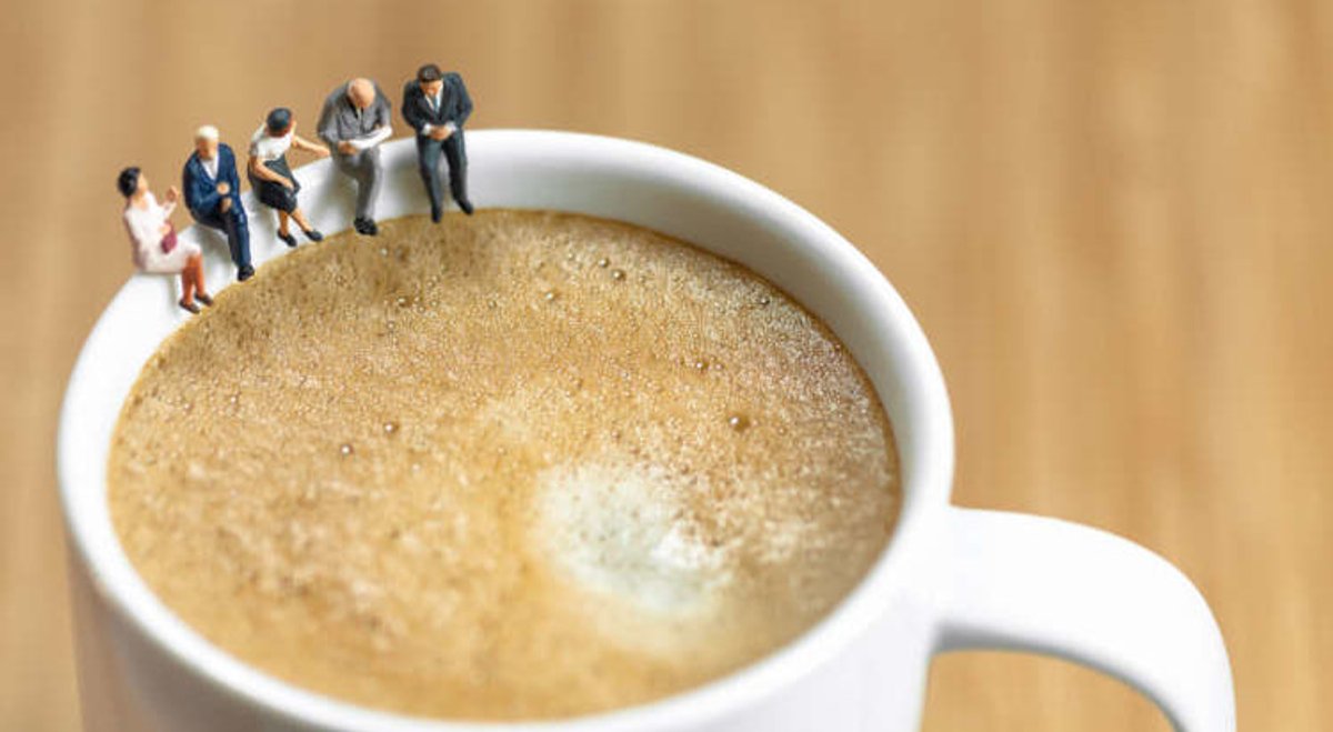 Miniature business team enjoying a virtual coffee break to connect remotely - Global Banking & Finance Review