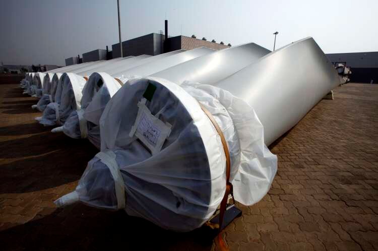 Wind turbine blades at Vestas factory, highlighting industry challenges due to Ukraine war - Global Banking & Finance Review