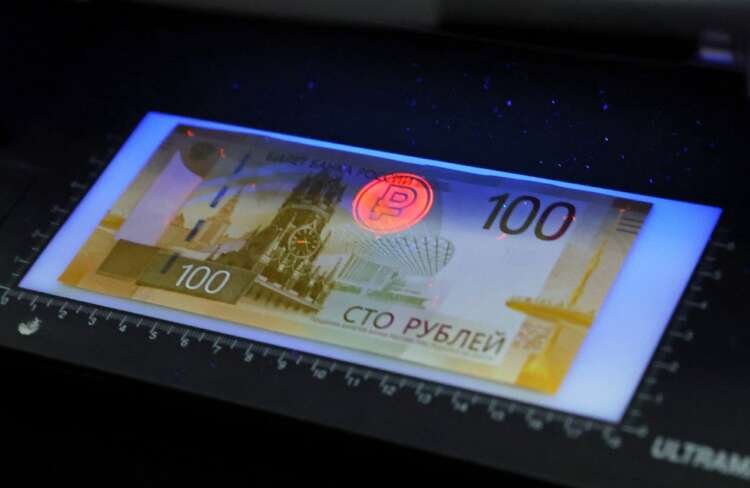 Image of the new Russian 100-rouble banknote, highlighting currency challenges in LNG trade - Global Banking & Finance Review
