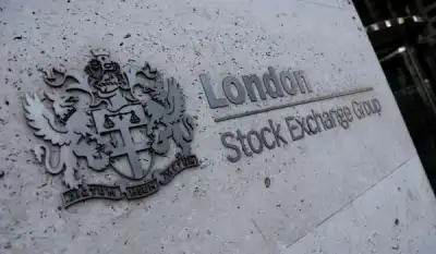 Image for London stocks pare losses as Bank of England steps in to buy bonds