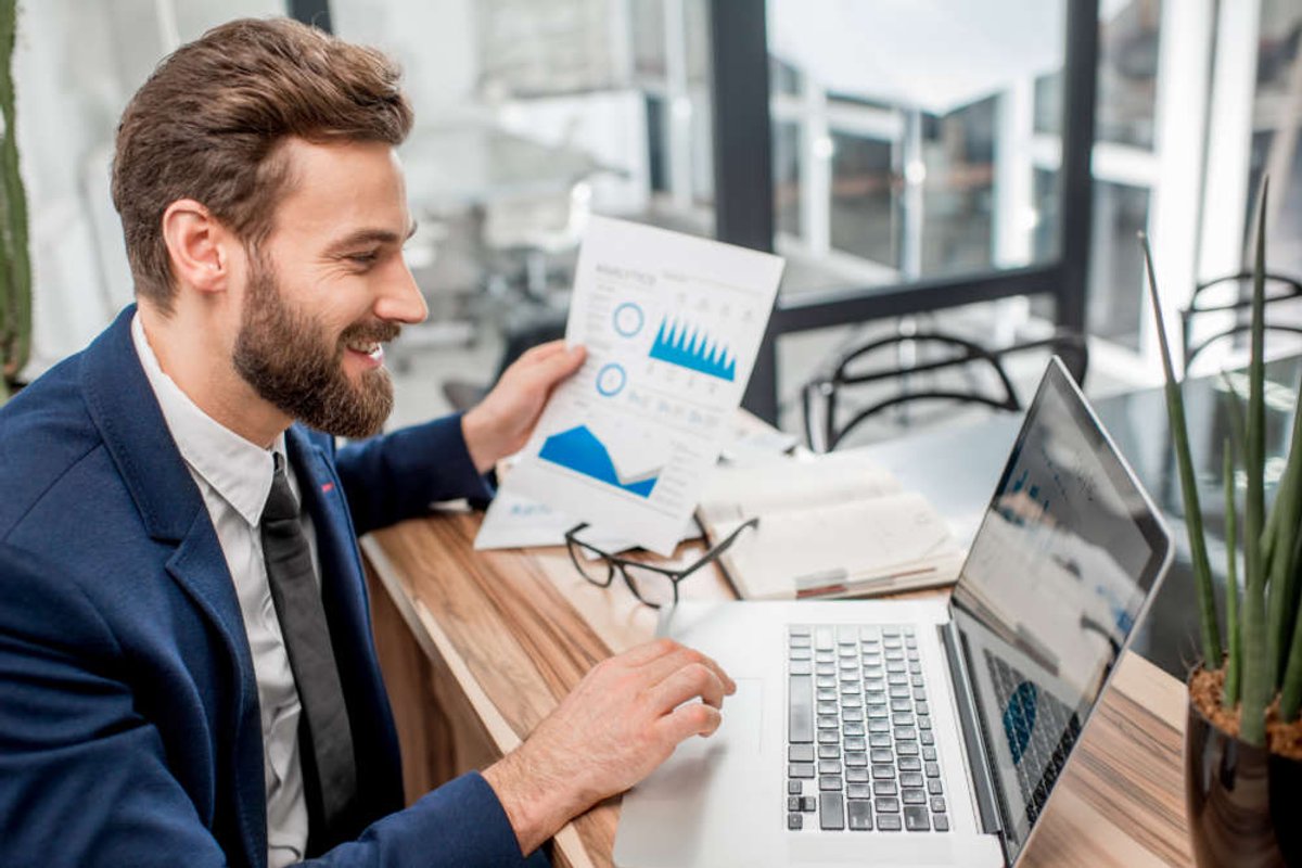 A professional analytic manager working at an office, enhancing client lifecycle management - Global Banking & Finance Review