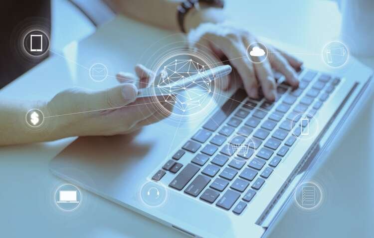 A cybersecurity professional analyzing data on a computer screen - Global Banking & Finance Review