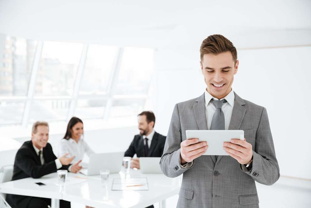 Business professionals discussing strategies for attracting top talent - Global Banking & Finance Review