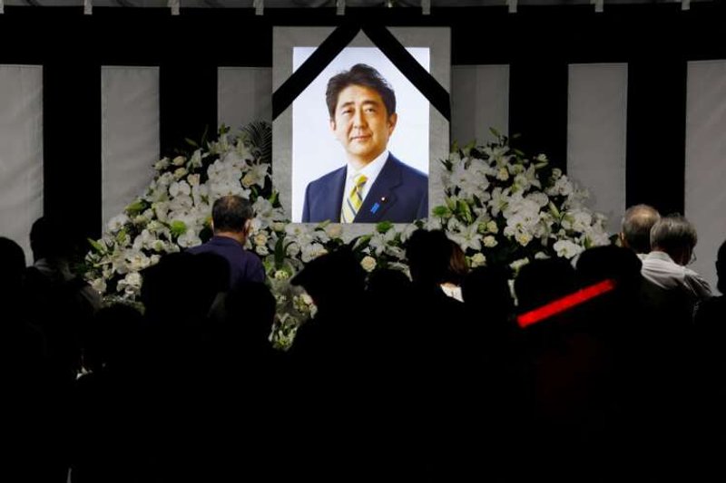 Image for With flowers and a gun salute, Japan bids farewell to divisive Abe
