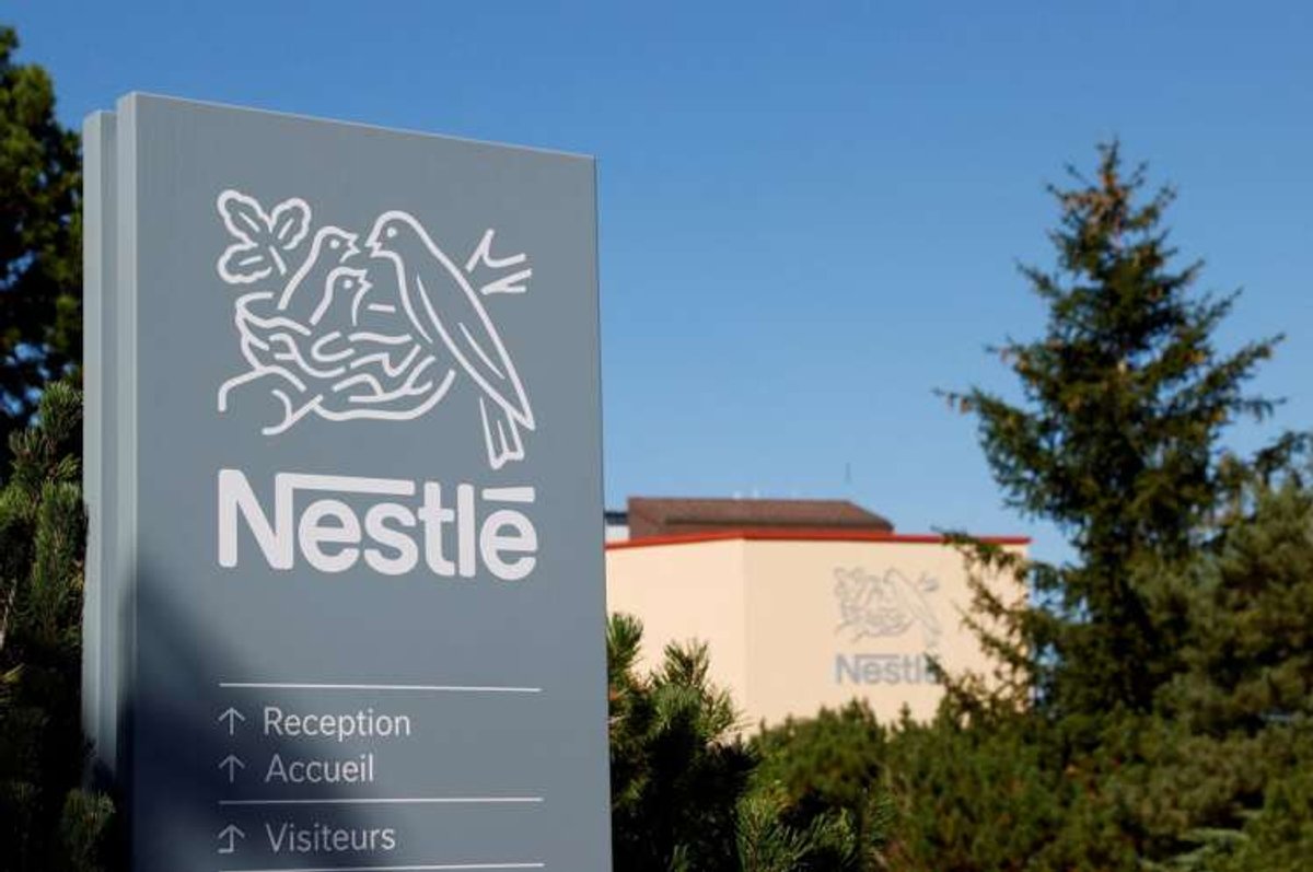 Nestle logo featured on the research center building, symbolizing growth outlook and consumer price hikes - Global Banking & Finance Review