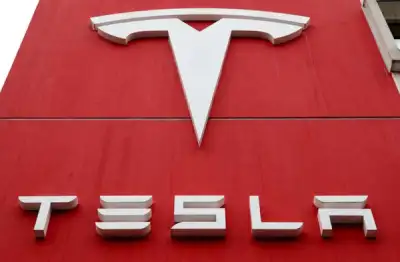 Image for Tesla surges almost 20%, biggest daily rise in a year