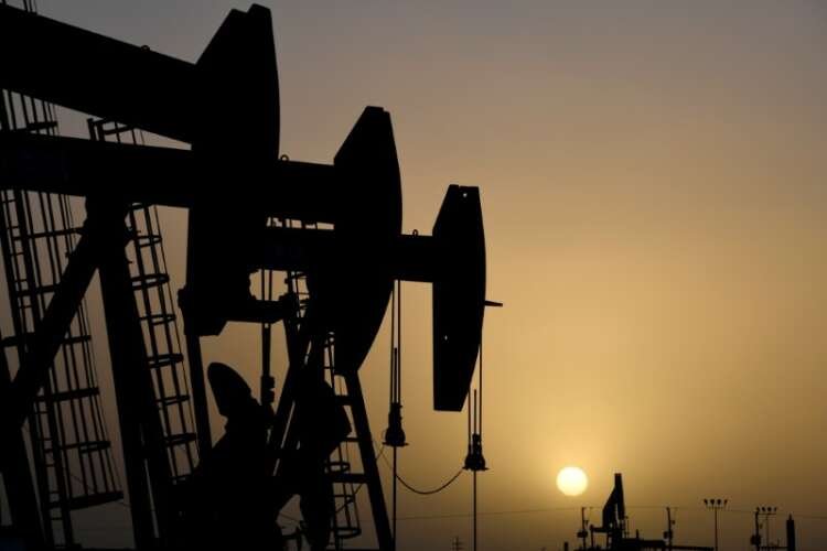 Pump jacks silhouetted against a sunset, depicting oil production amid rising demand - Global Banking & Finance Review