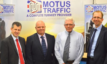 Group photo of Motus Traffic leaders celebrating acquisition of Traffic Signals Co-operative - Global Banking & Finance Review