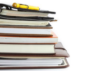 Books representing legal workflows and compliance in banking - Global Banking & Finance Review