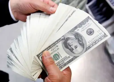 Image for Dollar near one-month high as Evergrande risks, Fed loom