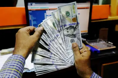 Image for Dollar headed for weekly loss, bitcoin hits record $49,000