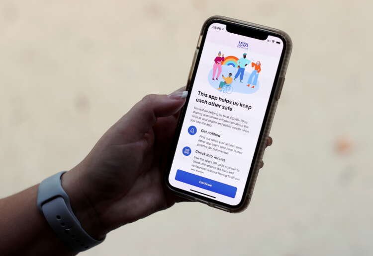 Image for COVID app told nearly 690,000 to isolate in England, Wales
