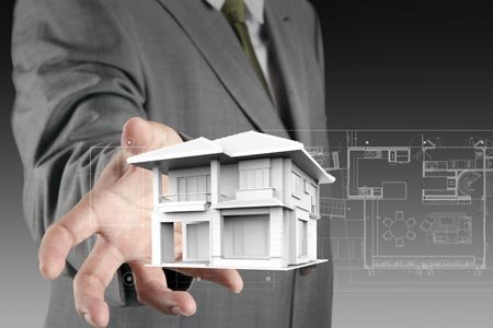 Hands holding a small house representing financial pressure on over-55 homeowners - Global Banking & Finance Review