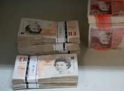 Image for Sterling falls against euro; speculators cut back long positions