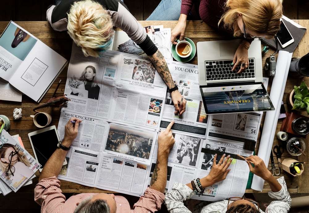 Business professionals discussing organisational agility in financial services - Global Banking & Finance Review