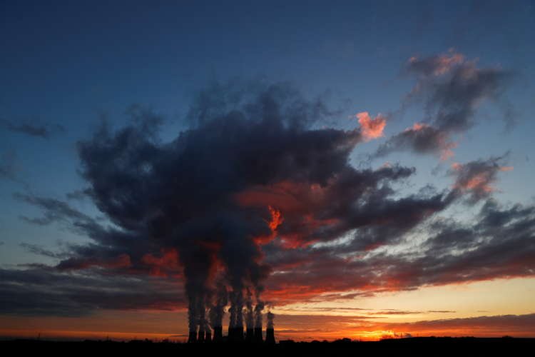 Drax power station at sunset, representing UK's energy sector - Global Banking & Finance Review