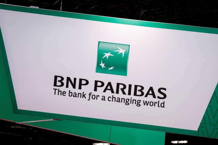 BNP Paribas logo displayed at a financial conference in Paris - Global Banking & Finance Review