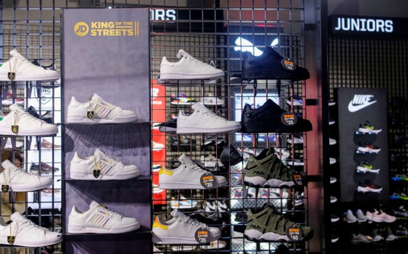 Image for JD Sports sees bills-free young shoppers boosting profits