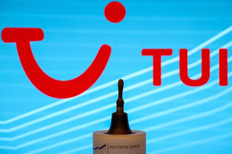 Travel operator TUI logo with financial graph indicating profit jump - Global Banking & Finance Review