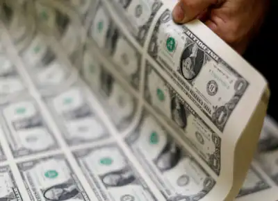 Image for Dollar steadies near 16-week low, yuan set for biggest weekly gain since 2005
