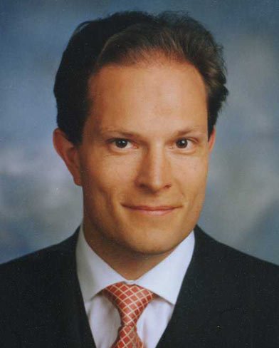 Dr. Michael Adam discussing risk and finance integration for financial services - Global Banking & Finance Review