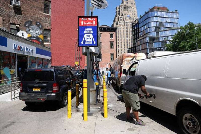 Image for Oil settles up as IEA hikes 2022 demand growth forecast