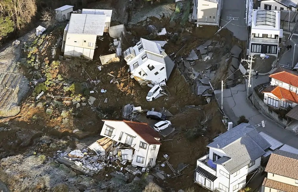 Destruction caused by Japan earthquake with collapsed homes and rescue efforts - Global Banking & Finance Review