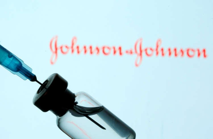 Vial and syringe with Johnson & Johnson logo illustrating COVID-19 vaccine study - Global Banking & Finance Review