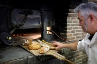 Image for Back to basics: wood-fired oven shields French baker from soaring energy costs