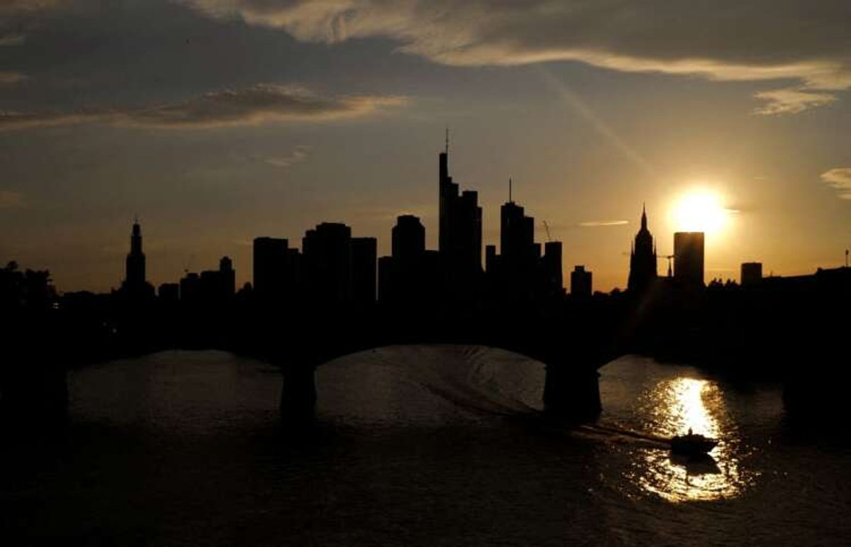 Frankfurt skyline at sunset, representing Germany's economic challenges - Global Banking & Finance Review