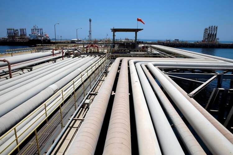 FILE PHOTO: An oil tanker is being loaded at Saudi Aramco’s Ras Tanura oil refinery and oil terminal in Saudi Arabia