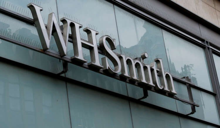 WH Smith logo displayed prominently in Manchester, related to UK minimum wage fines - Global Banking & Finance Review