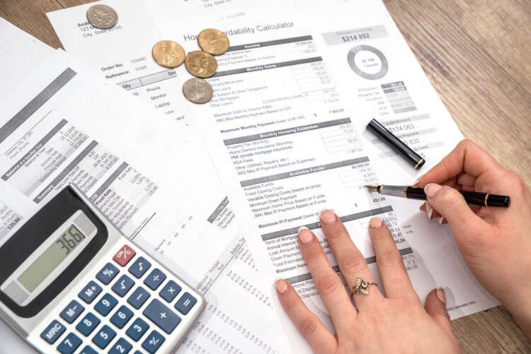 businessman planning monthly home loan, finance concept.