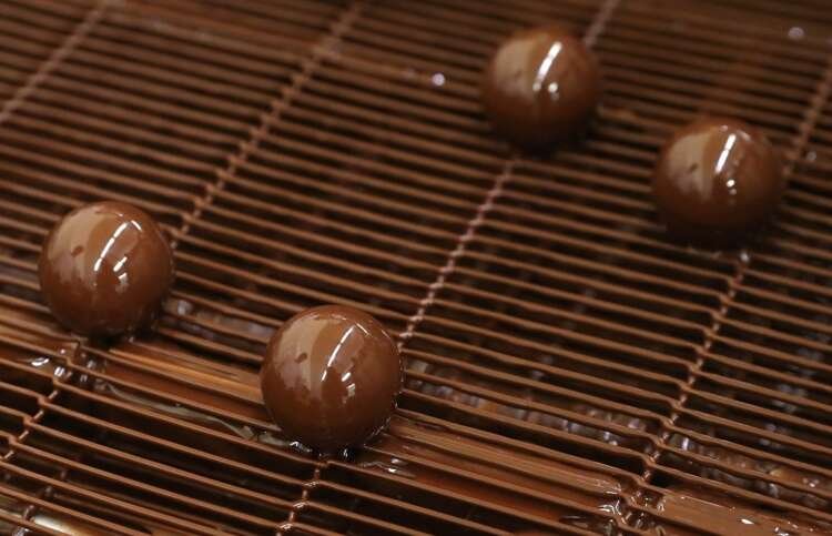 Assorted chocolates displayed at a workshop, highlighting consumer preferences - Global Banking & Finance Review