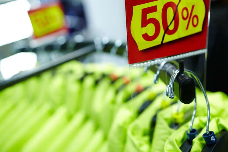 Sport and casual clothes on hangers, showcasing ecommerce potential - Global Banking & Finance Review