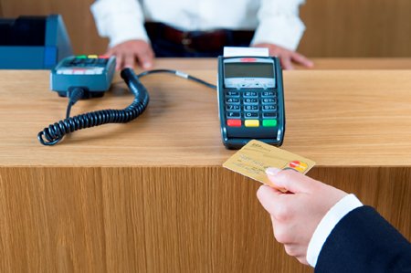 Payment terminal showcasing Bancontact and Maestro options for Belgian merchants - Global Banking & Finance Review